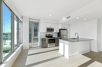 Kitchen And Dining Space at Link Apartments® H Street, Washington, Washington